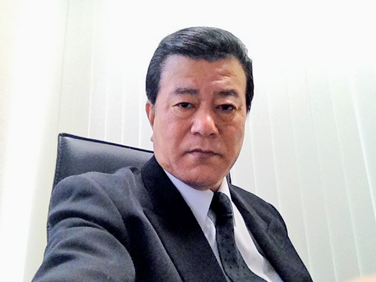 代表取締役 堀江 稔さん。情熱・やさしさ・自己成長(意欲)・チームワークがモットー